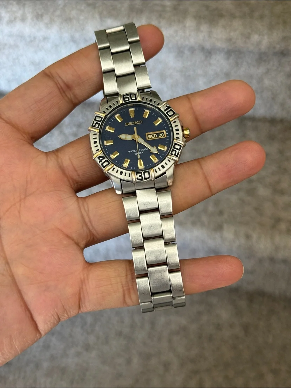 Seiko Blue Dial Stainless Steel Watch with Gold Accents Mens Watch